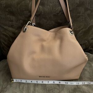 Michael Kors handbag.  Beautiful light gold color.  Great for any season.